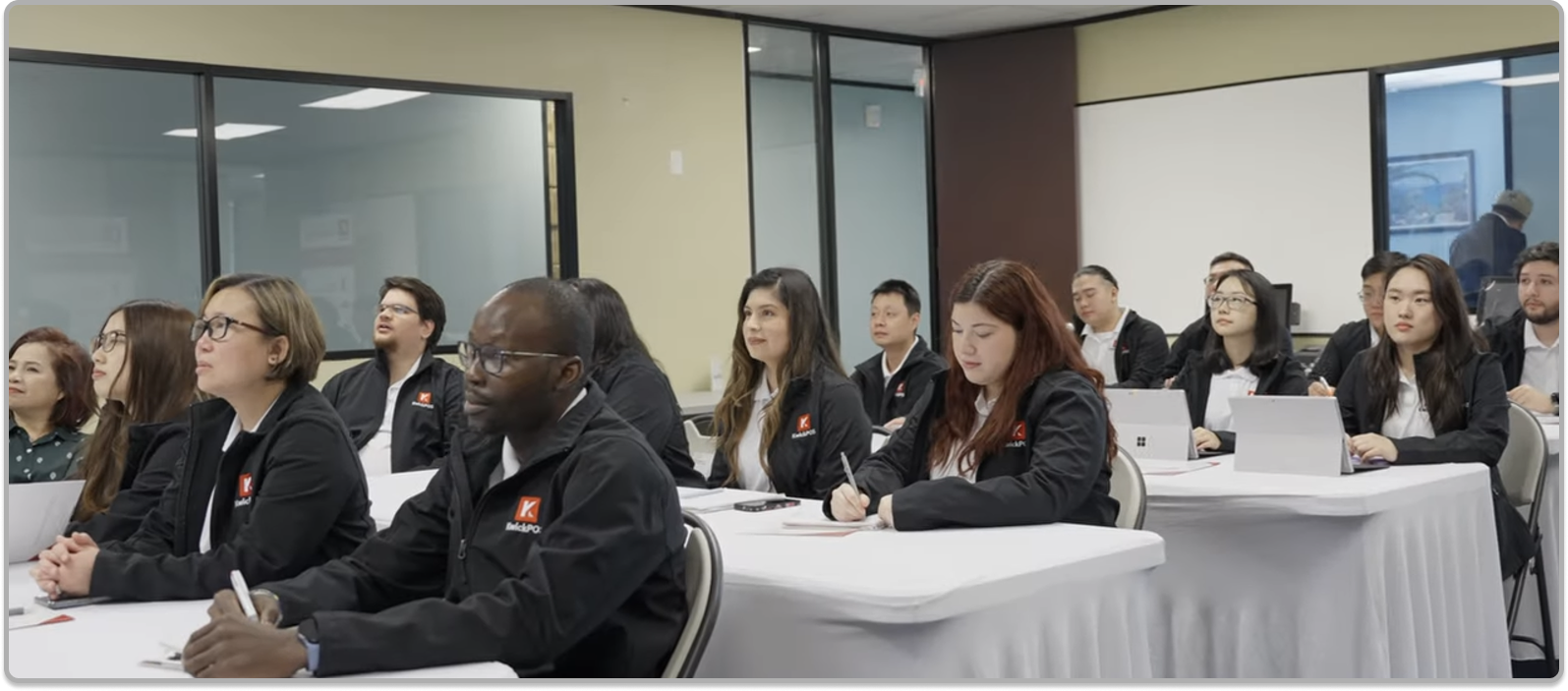 KwickOS team collaborating in a meeting